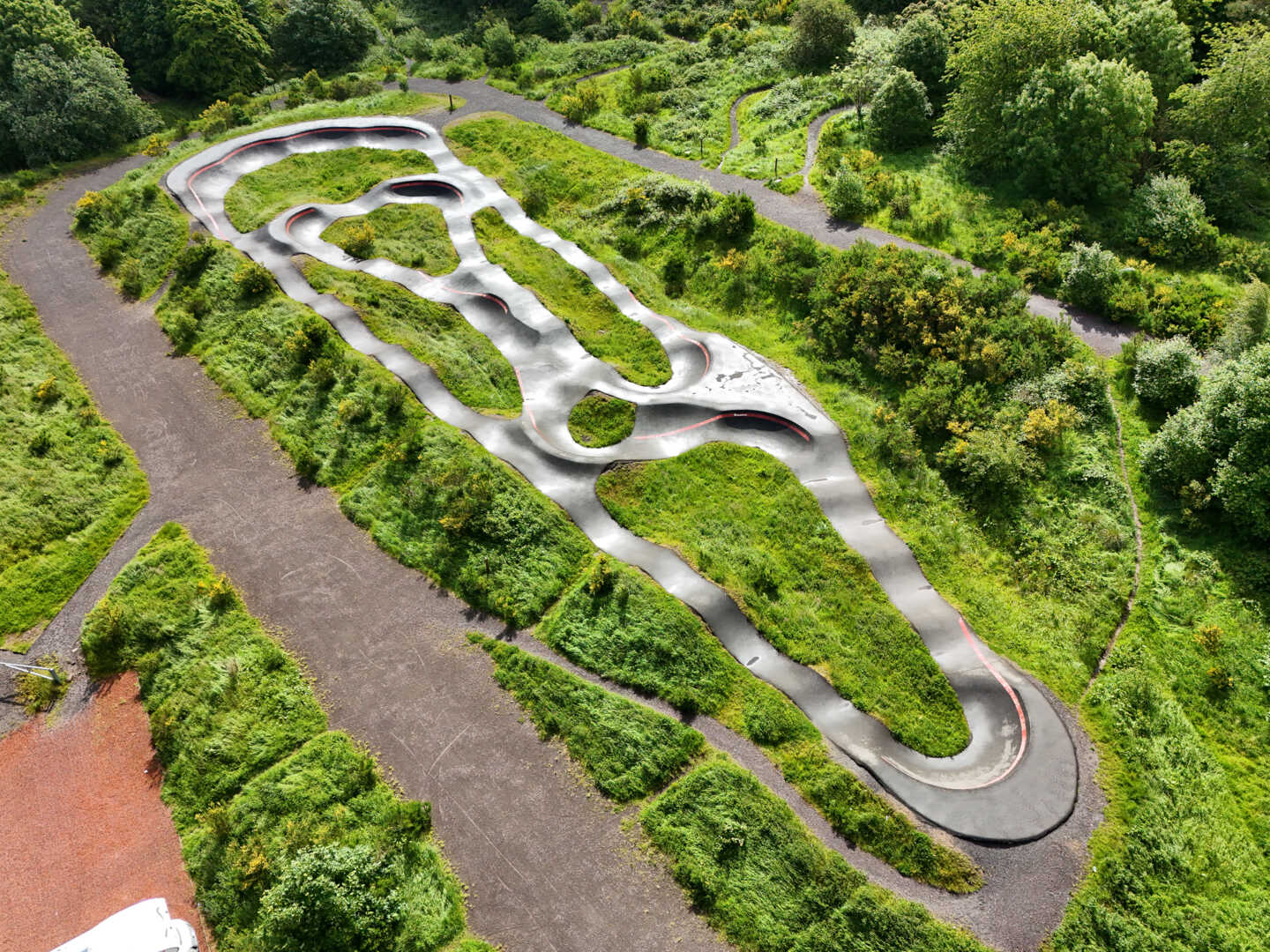 Aerial view of Cathkin Braes pump track in green parkland