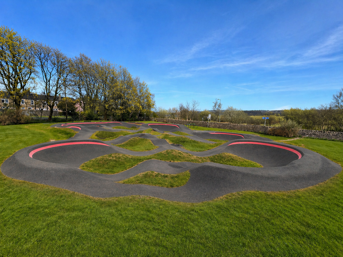 A pump track in parkland: indicative impression